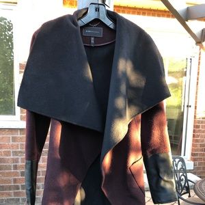 BCBG  , leather detail . burgundy and black